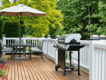 brown deck with white railings installed by professional deck builders