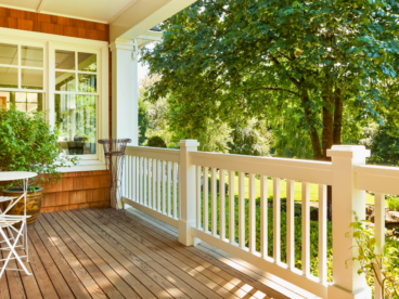 wood deck with white wood deck railing