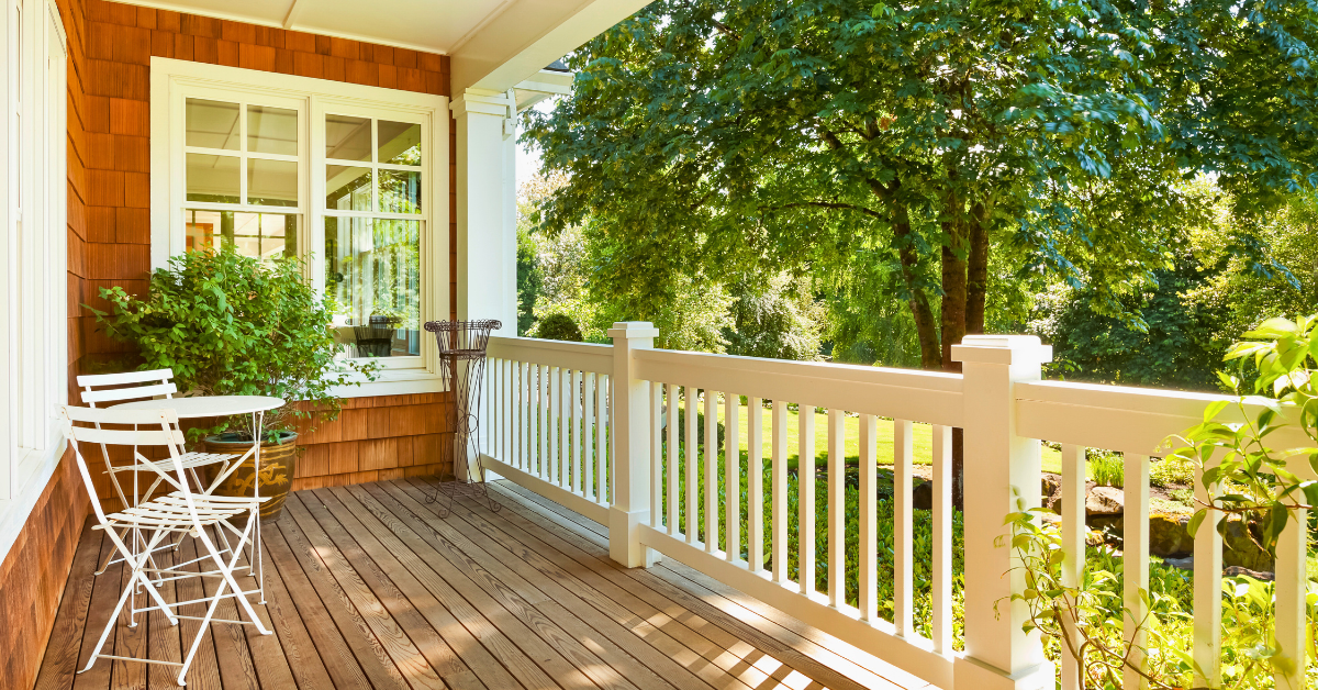 wood deck with white wood deck railing