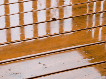 deck covered in water and in need of deck waterproofing